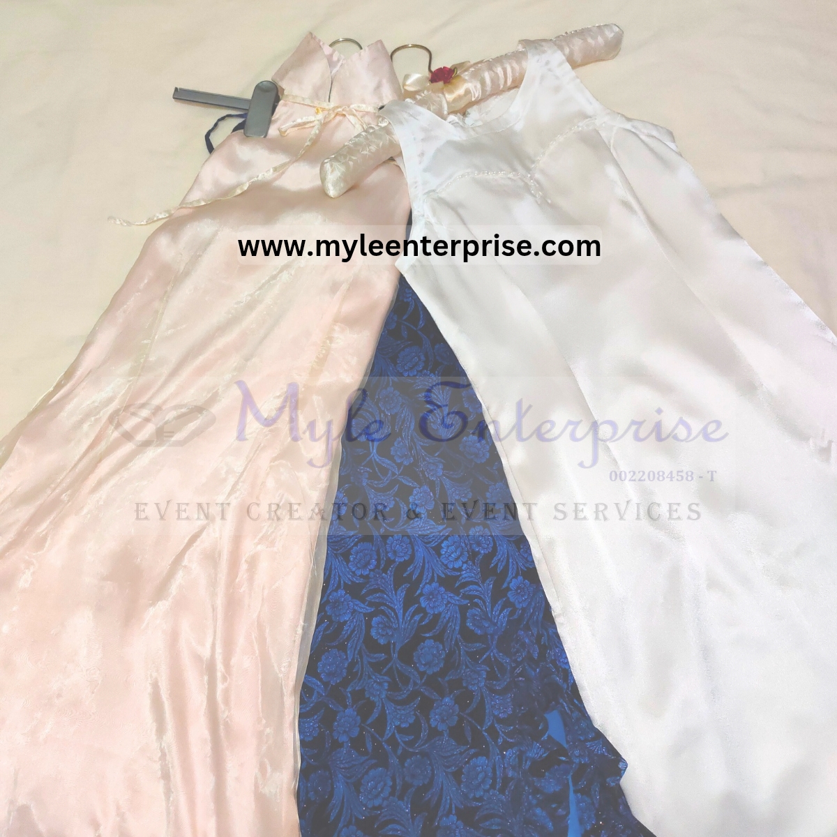 Emcee M.Y.'s own design of evening dresses.